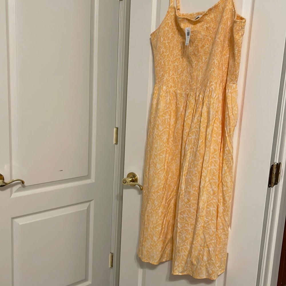 Old navy midlength dress.  Orange with pockets!! Perfect for a beach dinner!